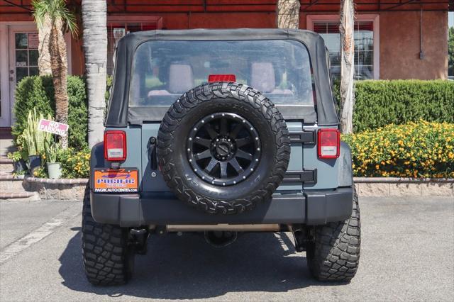 used 2015 Jeep Wrangler car, priced at $17,995