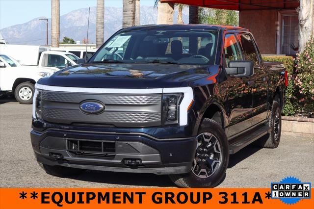 used 2023 Ford F-150 Lightning car, priced at $41,996