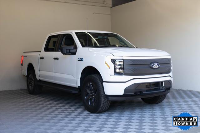 used 2024 Ford F-150 Lightning car, priced at $49,995