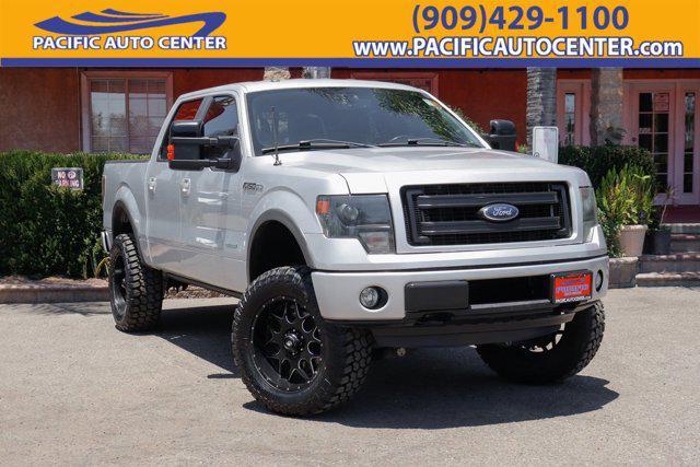 used 2013 Ford F-150 car, priced at $18,995