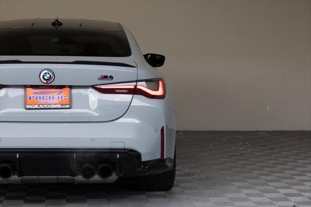 used 2023 BMW M4 car, priced at $73,995