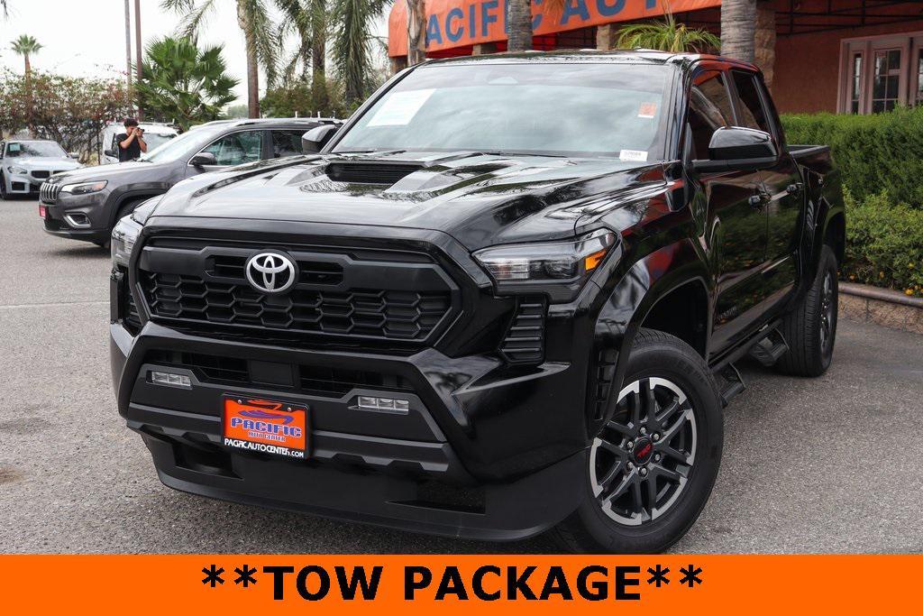used 2024 Toyota Tacoma car, priced at $33,995
