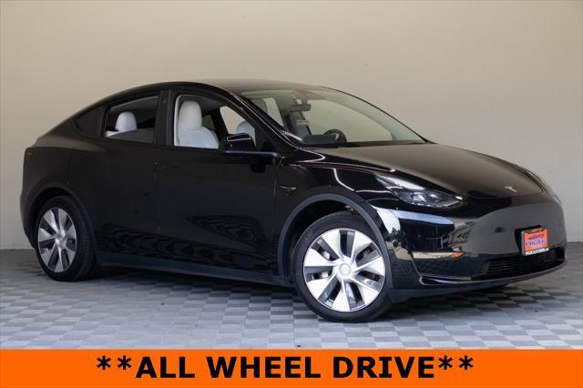 used 2023 Tesla Model Y car, priced at $32,995