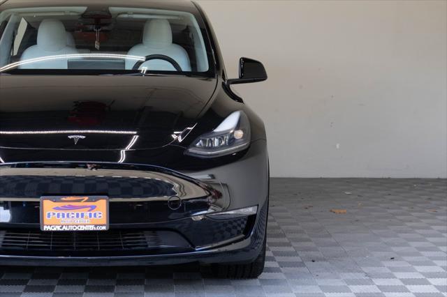 used 2023 Tesla Model Y car, priced at $32,995