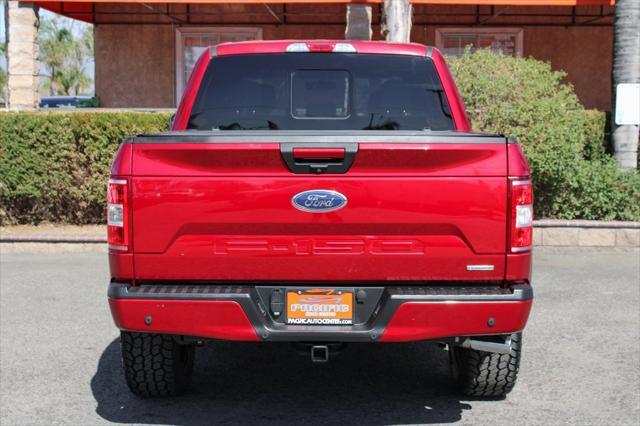 used 2018 Ford F-150 car, priced at $22,995