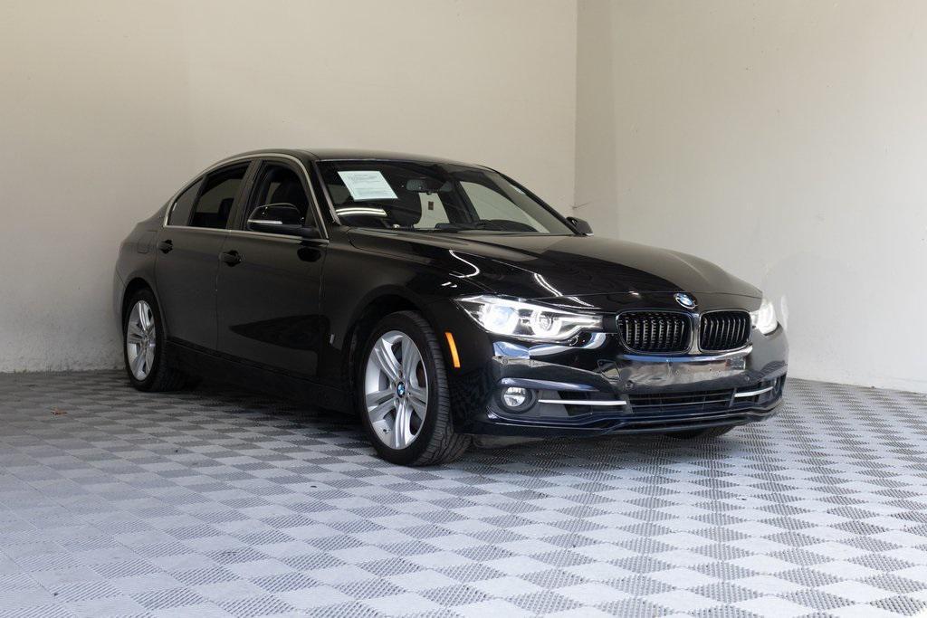 used 2018 BMW 330e car, priced at $11,995