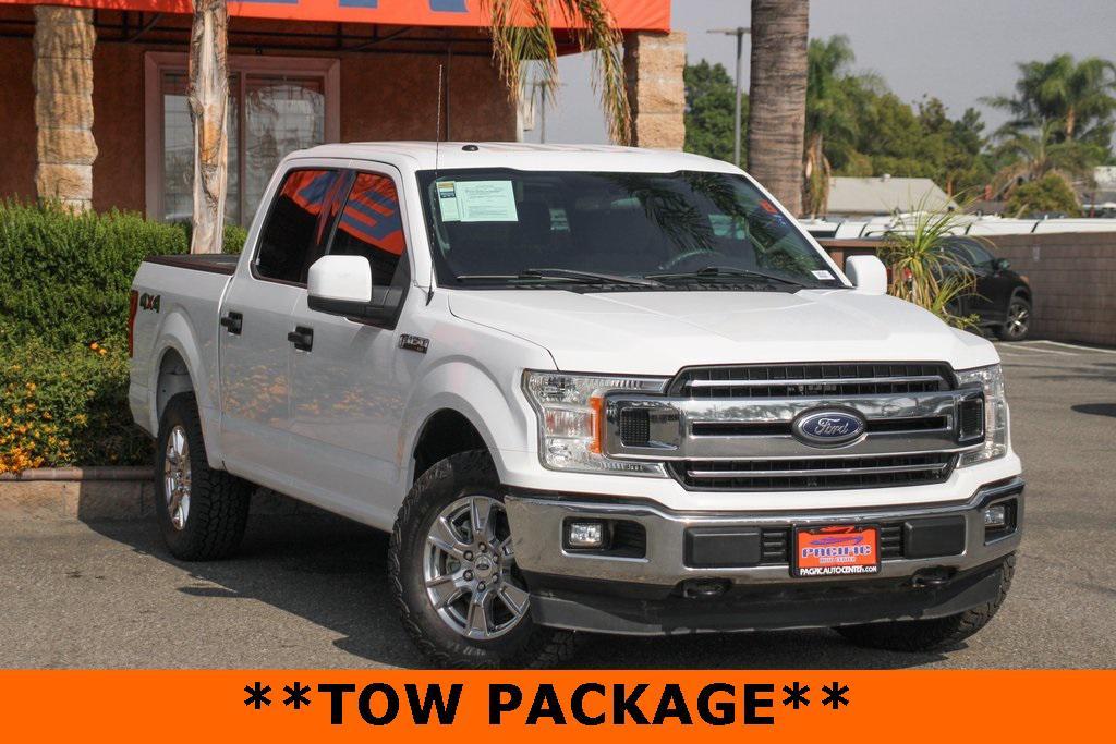 used 2018 Ford F-150 car, priced at $14,995