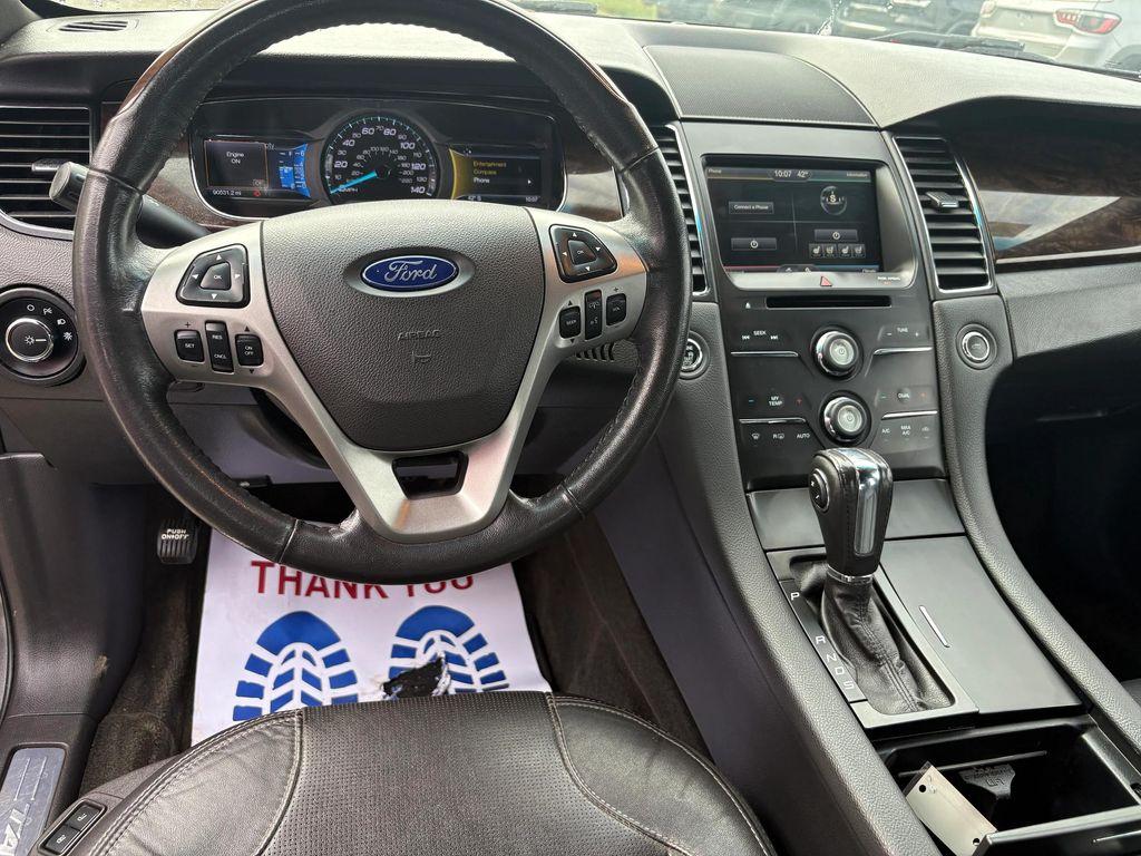 used 2015 Ford Taurus car, priced at $12,487