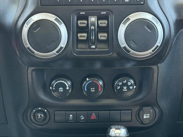 used 2014 Jeep Wrangler Unlimited car, priced at $17,474