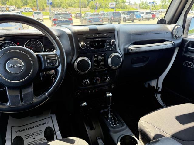 used 2014 Jeep Wrangler Unlimited car, priced at $17,474