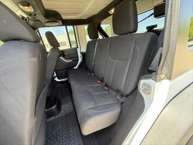 used 2014 Jeep Wrangler Unlimited car, priced at $17,474