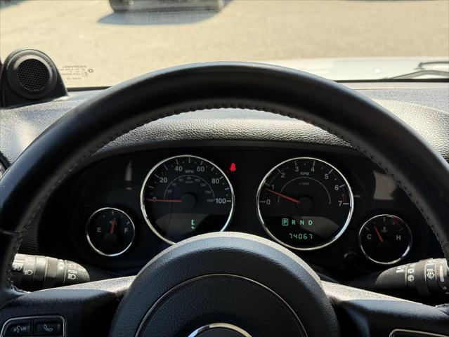 used 2014 Jeep Wrangler Unlimited car, priced at $17,474