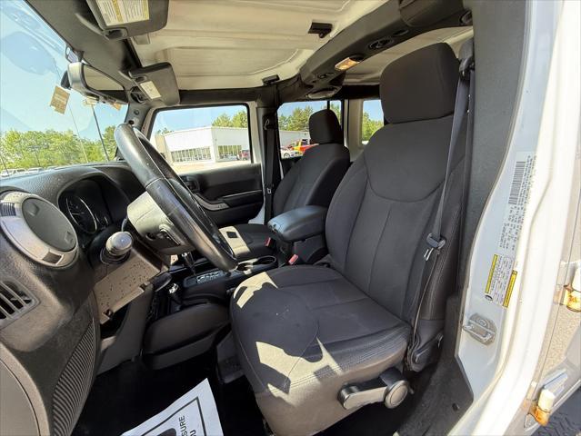 used 2014 Jeep Wrangler Unlimited car, priced at $17,474
