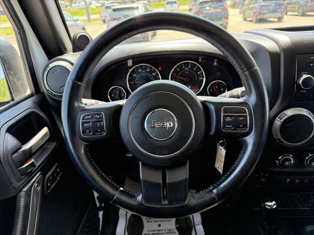 used 2014 Jeep Wrangler Unlimited car, priced at $17,474