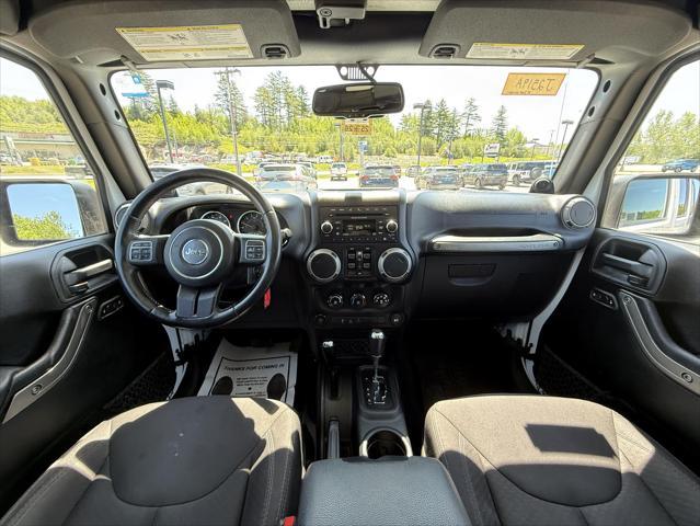 used 2014 Jeep Wrangler Unlimited car, priced at $17,474