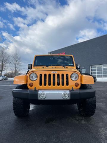 used 2013 Jeep Wrangler Unlimited car, priced at $13,889