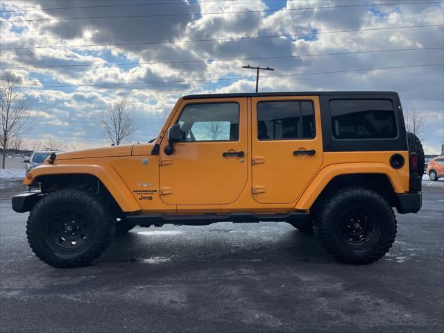 used 2013 Jeep Wrangler Unlimited car, priced at $13,889