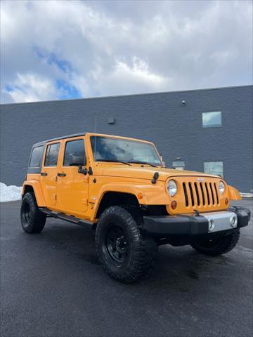 used 2013 Jeep Wrangler Unlimited car, priced at $13,889