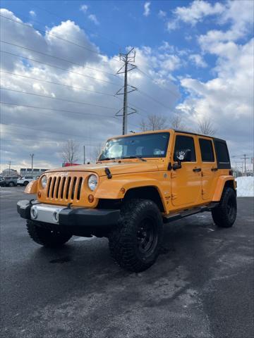 used 2013 Jeep Wrangler Unlimited car, priced at $13,889