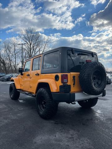 used 2013 Jeep Wrangler Unlimited car, priced at $13,889