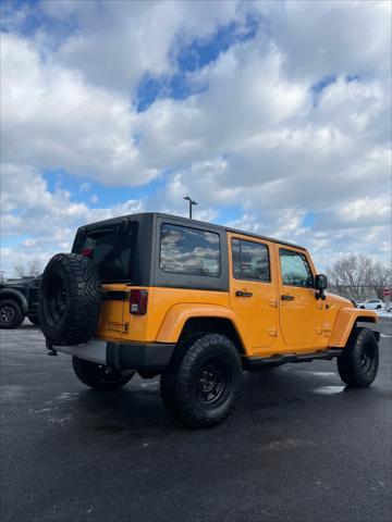 used 2013 Jeep Wrangler Unlimited car, priced at $13,889