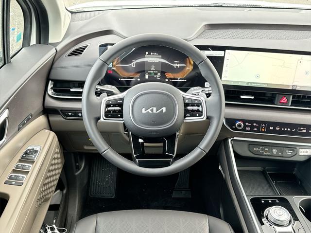 new 2025 Kia Carnival Hybrid car, priced at $44,234