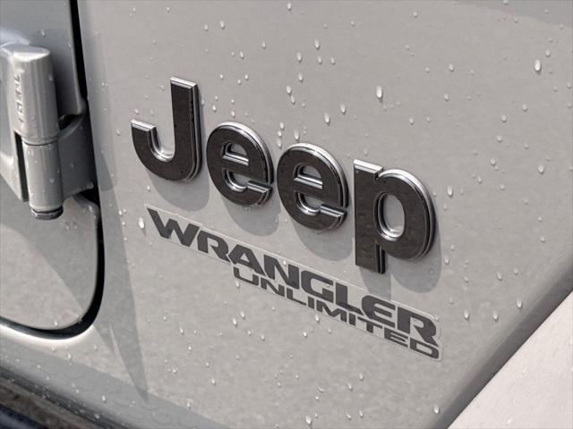 used 2022 Jeep Wrangler Unlimited car, priced at $34,919