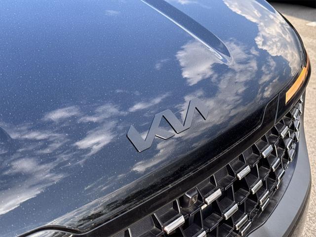 new 2025 Kia Carnival Hybrid car, priced at $49,826