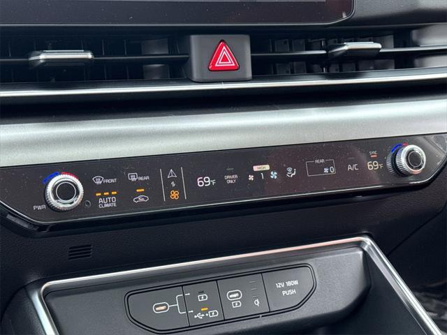 new 2025 Kia Carnival Hybrid car, priced at $49,826