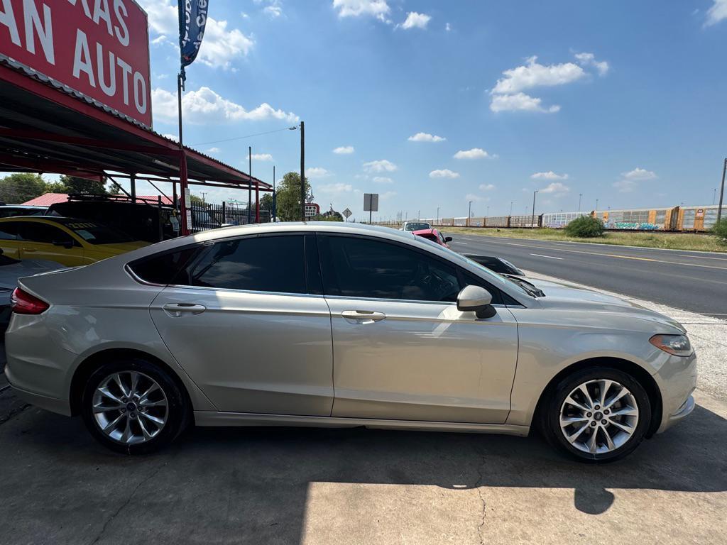 used 2017 Ford Fusion car, priced at $6,000