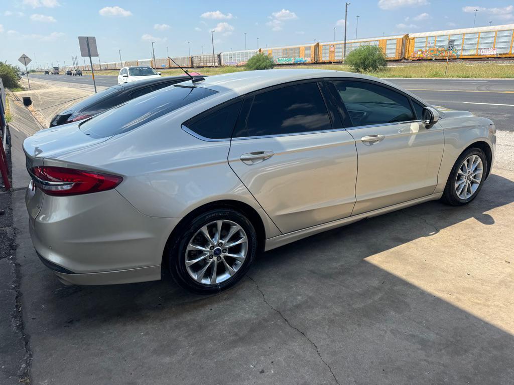 used 2017 Ford Fusion car, priced at $6,000