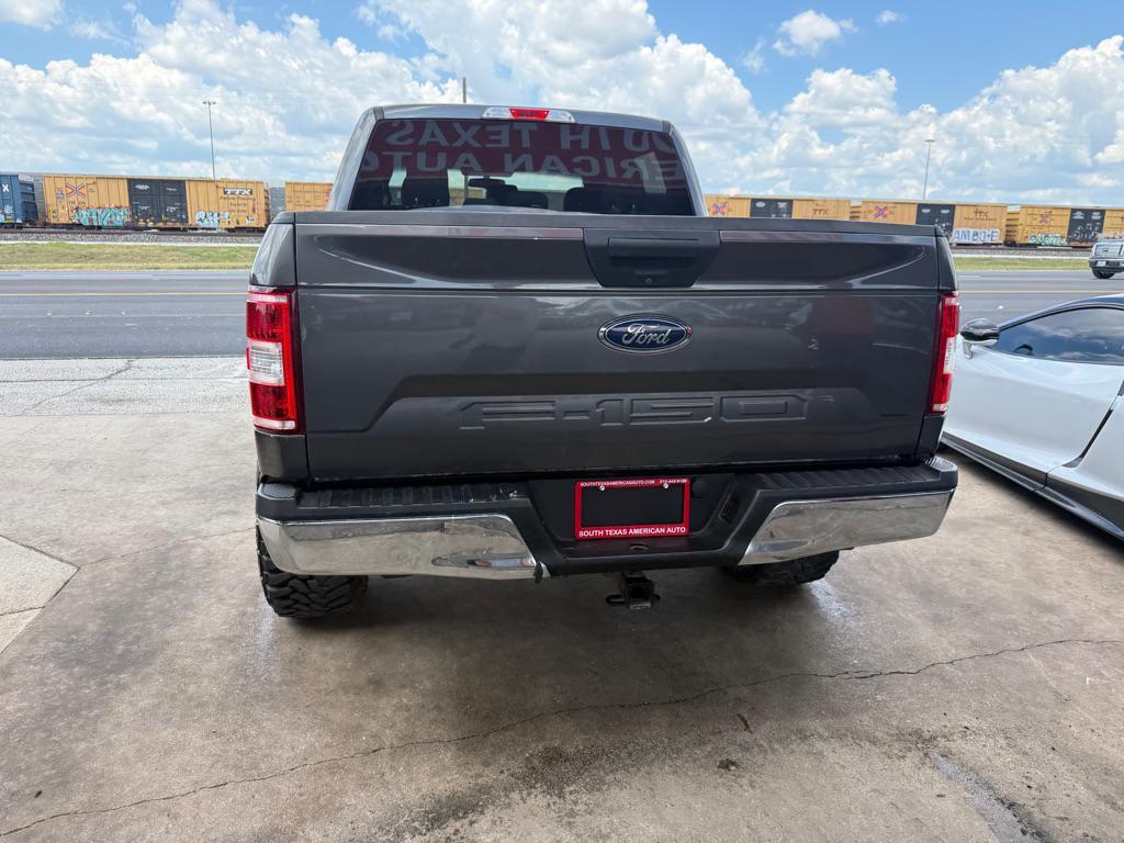 used 2018 Ford F-150 car, priced at $18,996