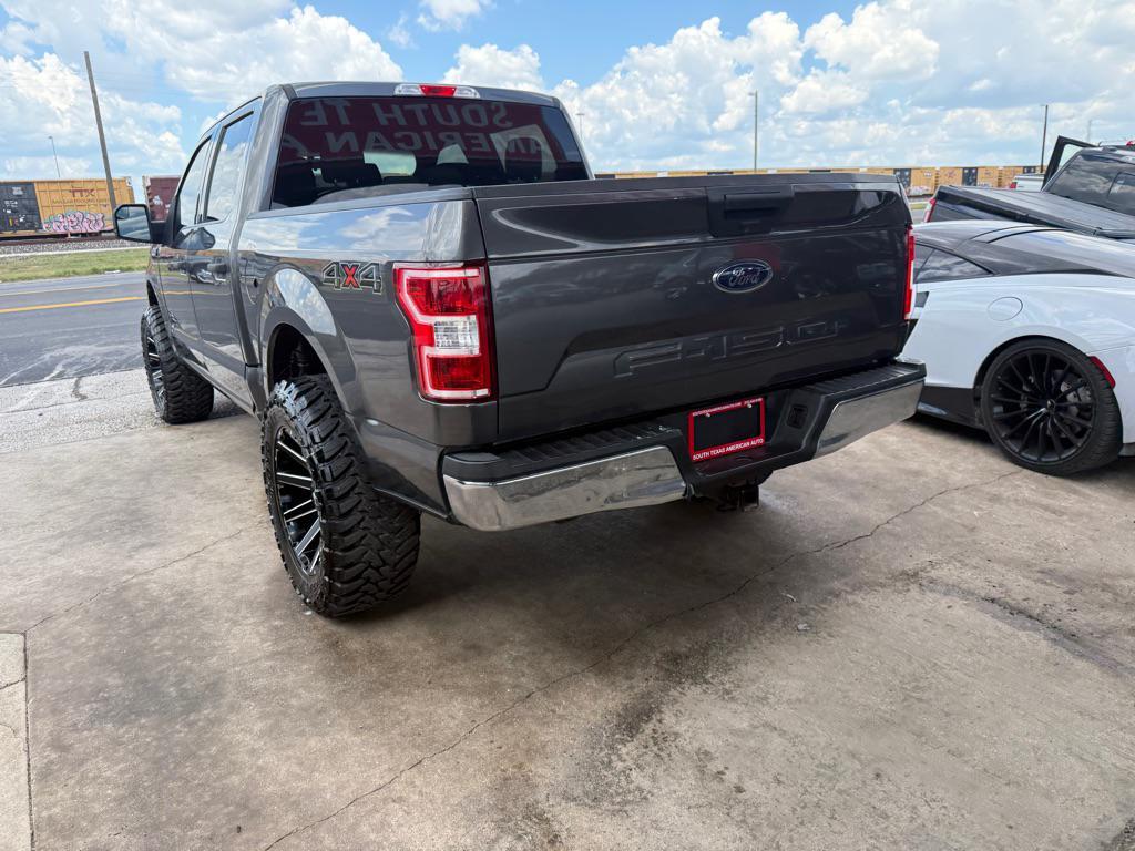 used 2018 Ford F-150 car, priced at $18,996
