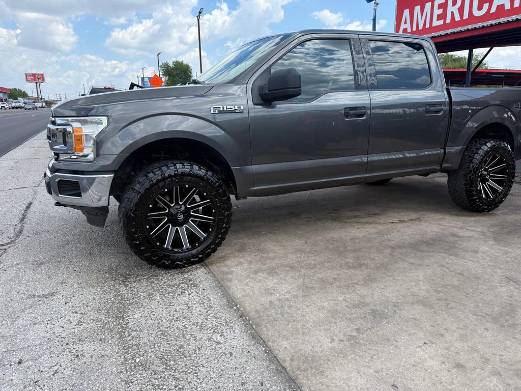 used 2018 Ford F-150 car, priced at $18,996