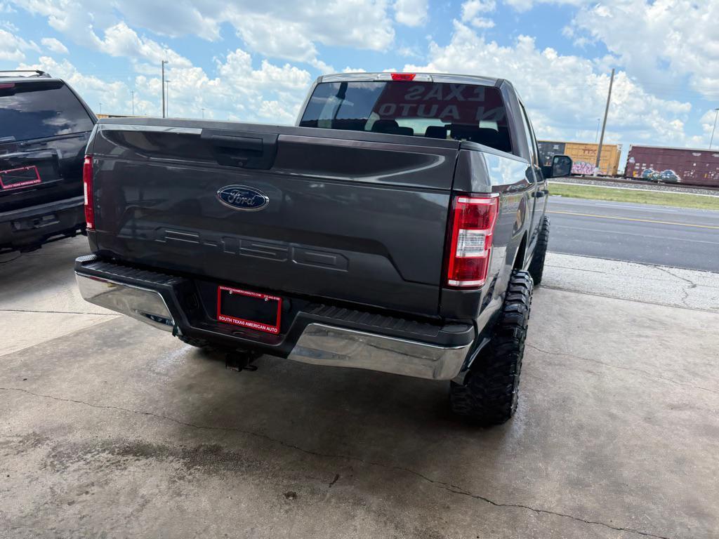 used 2018 Ford F-150 car, priced at $18,996