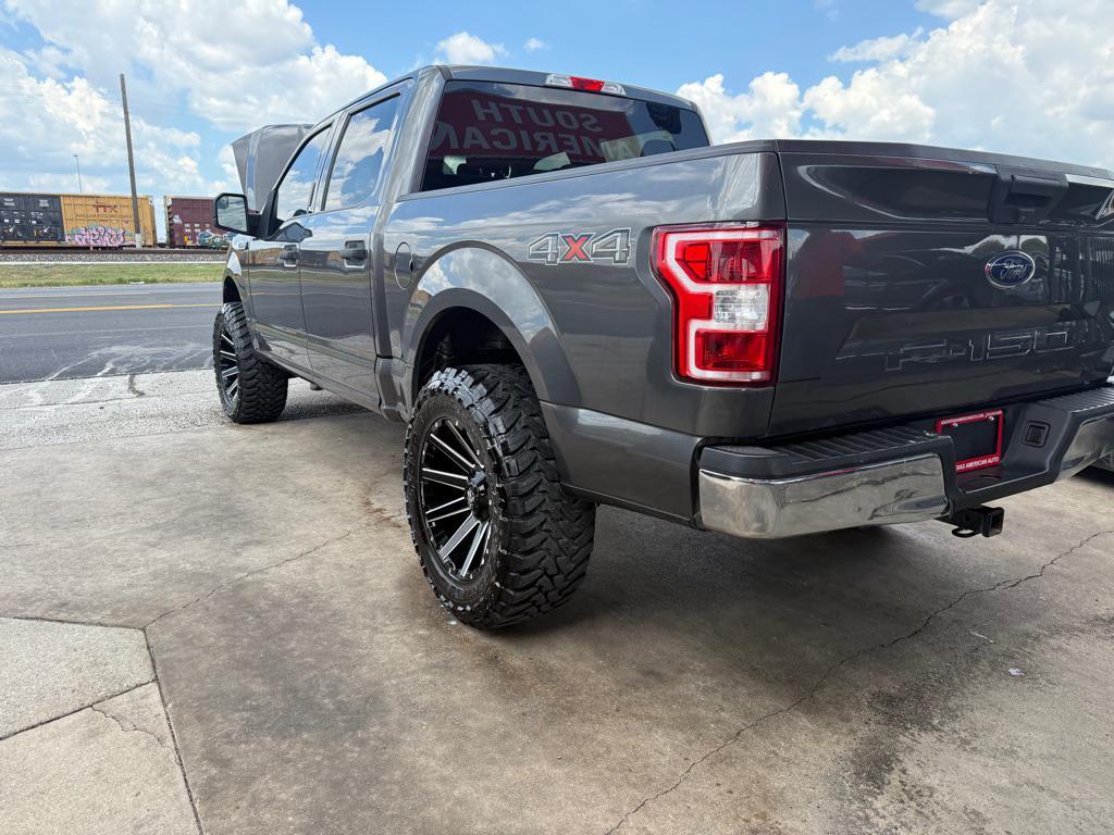 used 2018 Ford F-150 car, priced at $18,996