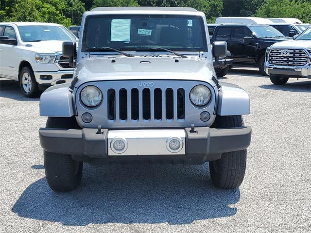 used 2015 Jeep Wrangler Unlimited car, priced at $18,588
