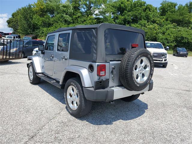 used 2015 Jeep Wrangler Unlimited car, priced at $18,588