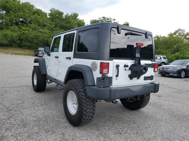 used 2018 Jeep Wrangler JK Unlimited car, priced at $21,839