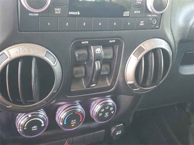 used 2016 Jeep Wrangler Unlimited car, priced at $10,987