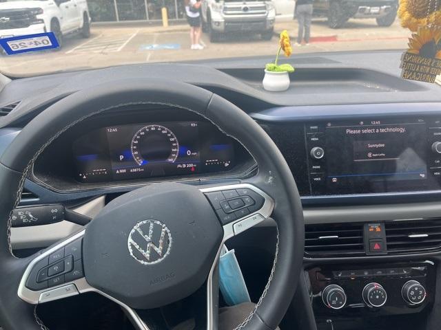 used 2023 Volkswagen Taos car, priced at $18,994