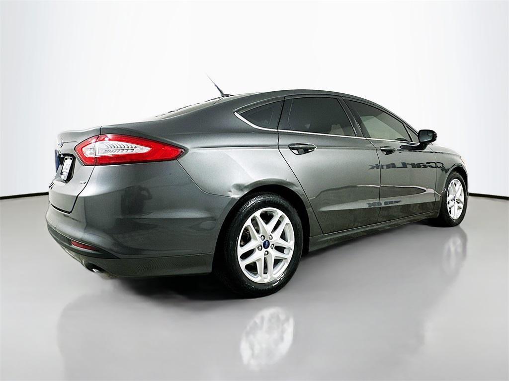 used 2016 Ford Fusion car, priced at $6,900