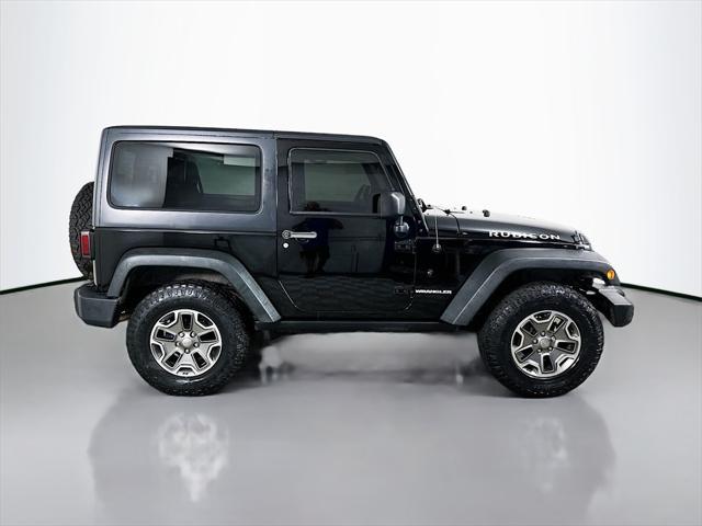 used 2013 Jeep Wrangler car, priced at $17,900