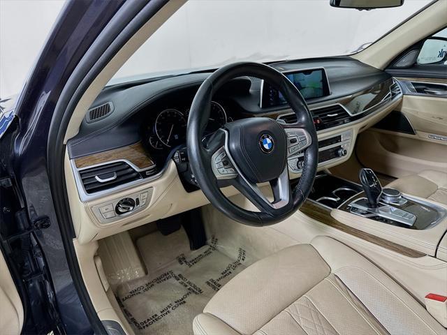 used 2016 BMW 740 car, priced at $18,444