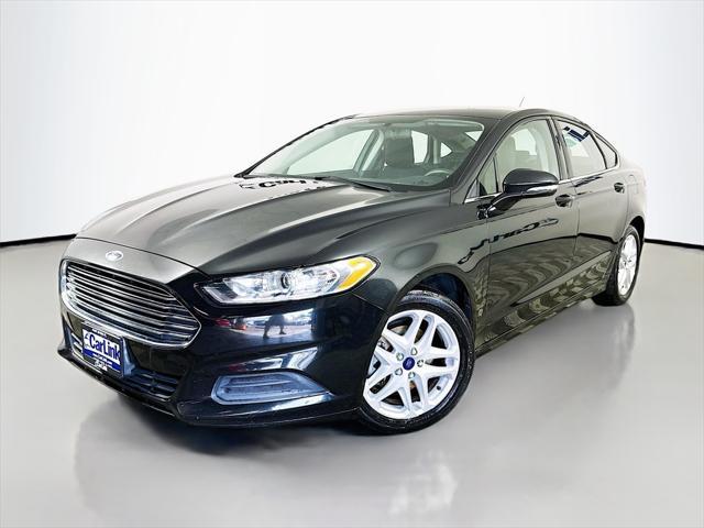 used 2015 Ford Fusion car, priced at $6,900