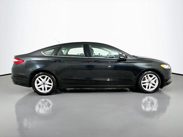 used 2015 Ford Fusion car, priced at $6,900