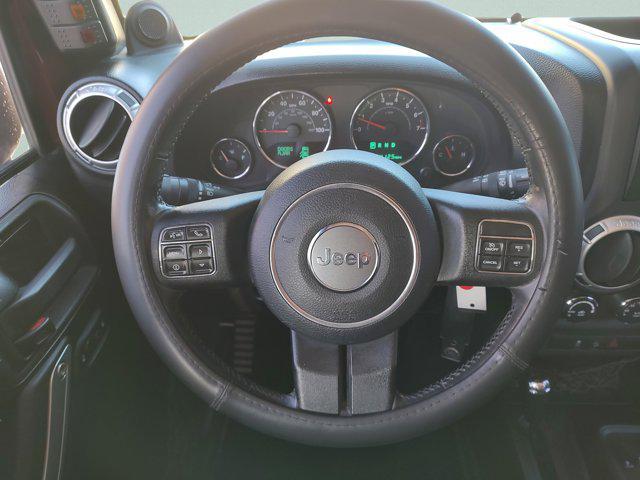 used 2012 Jeep Wrangler Unlimited car, priced at $15,969