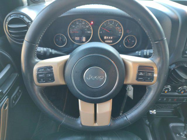 used 2014 Jeep Wrangler Unlimited car, priced at $15,496