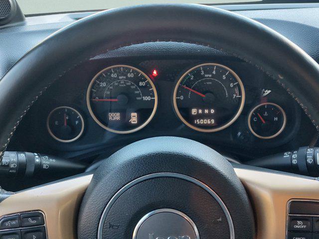 used 2014 Jeep Wrangler Unlimited car, priced at $15,496