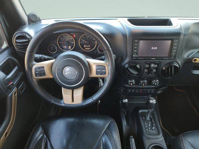 used 2014 Jeep Wrangler Unlimited car, priced at $15,496